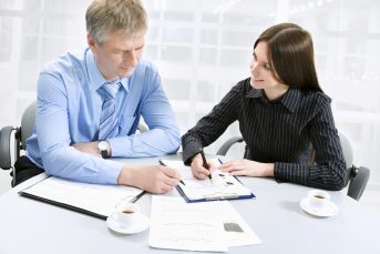 Business man and woman in a meeting